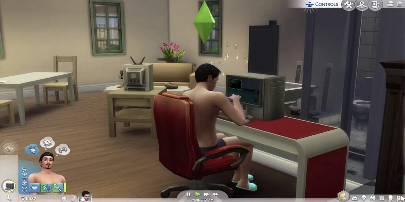 герой работает дома за компьютером в The Sims 4