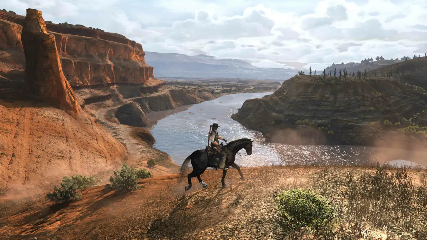 герой на лошади в горном каньоне в Red Dead Redemption