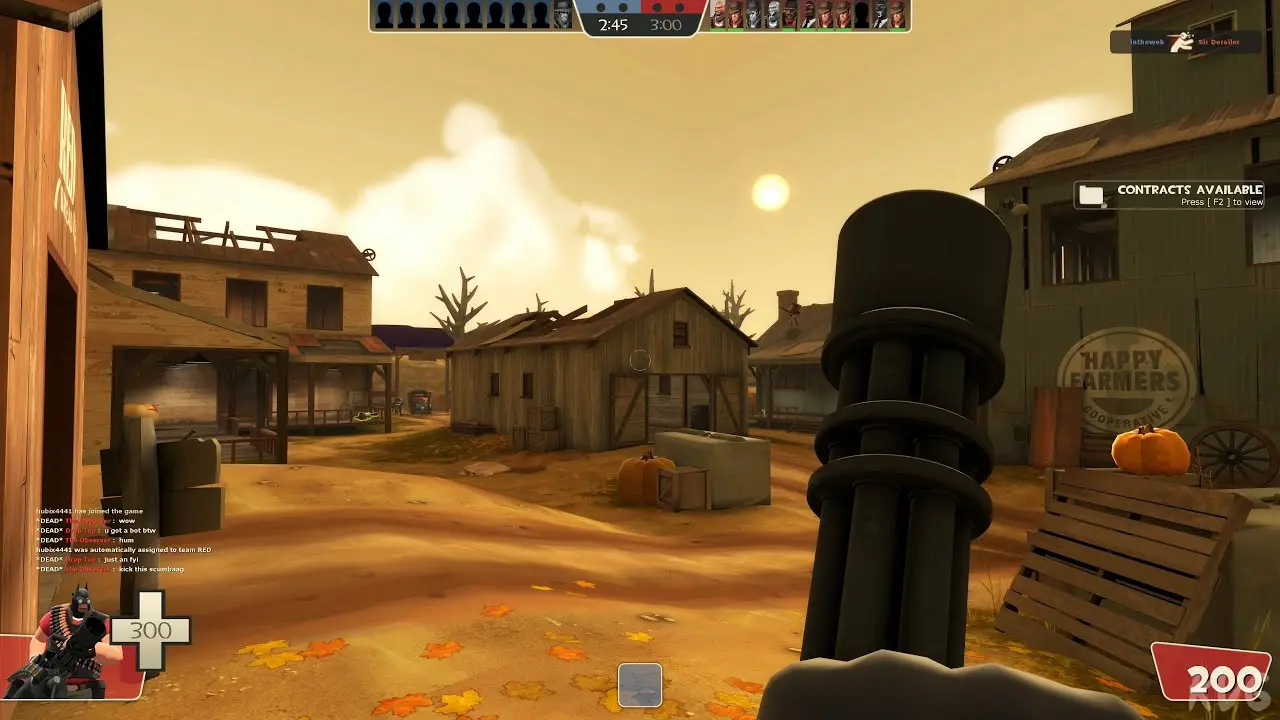 игрок тащит тяжелый пулемет в Team Fortress 2